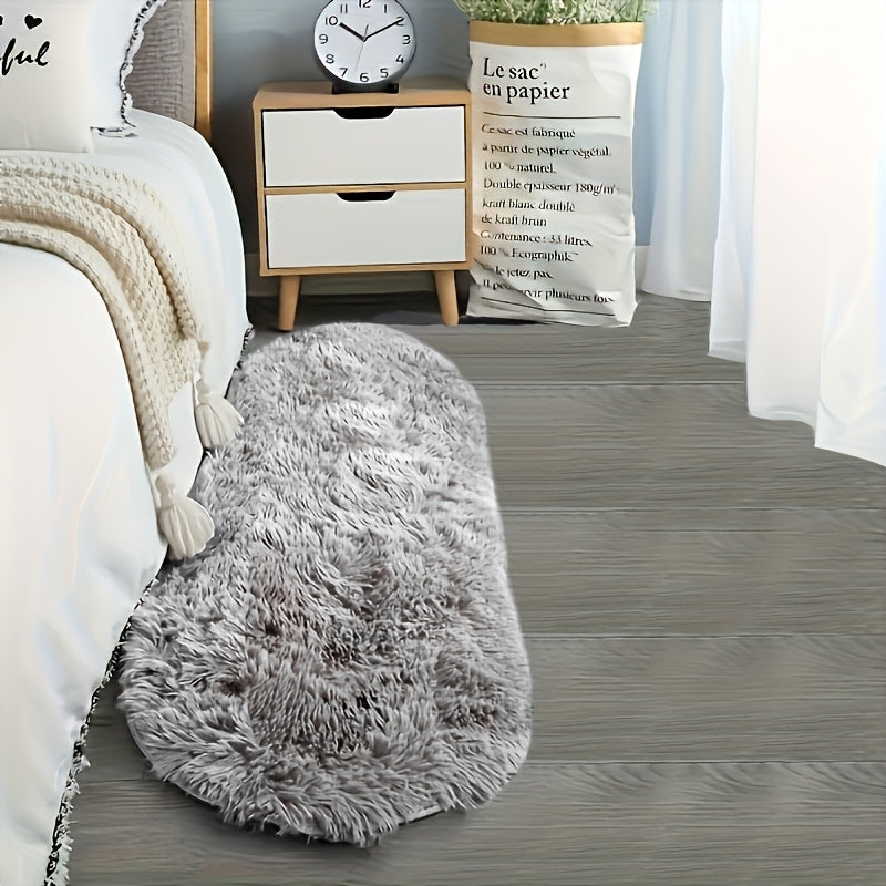 Soft faux fur oval area mat that is luxurious, plush, non-slip, hand washable, and durable. Perfect for adding a touch of elegance to your bedroom, living room, or home decor. Available in two sizes.