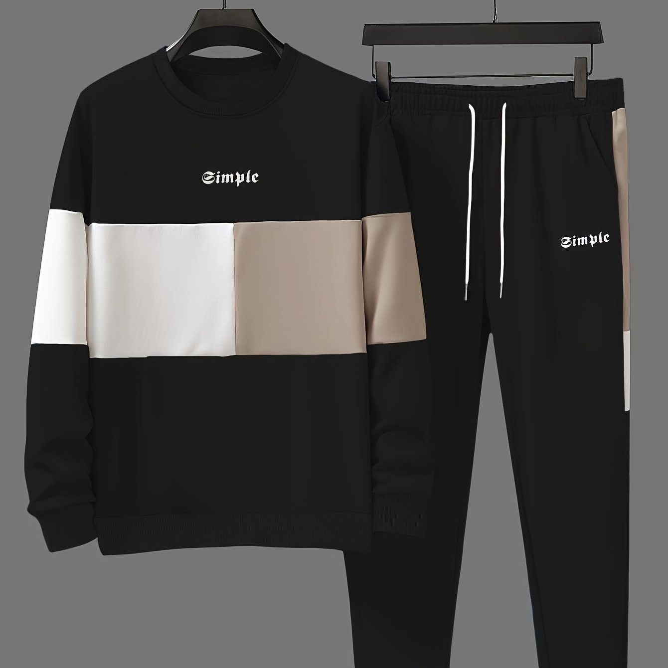 Men's casual crew neck sweatshirt and joggers set. Color block design in polyester blend, machine washable. Ideal for spring and fall, leisure style.