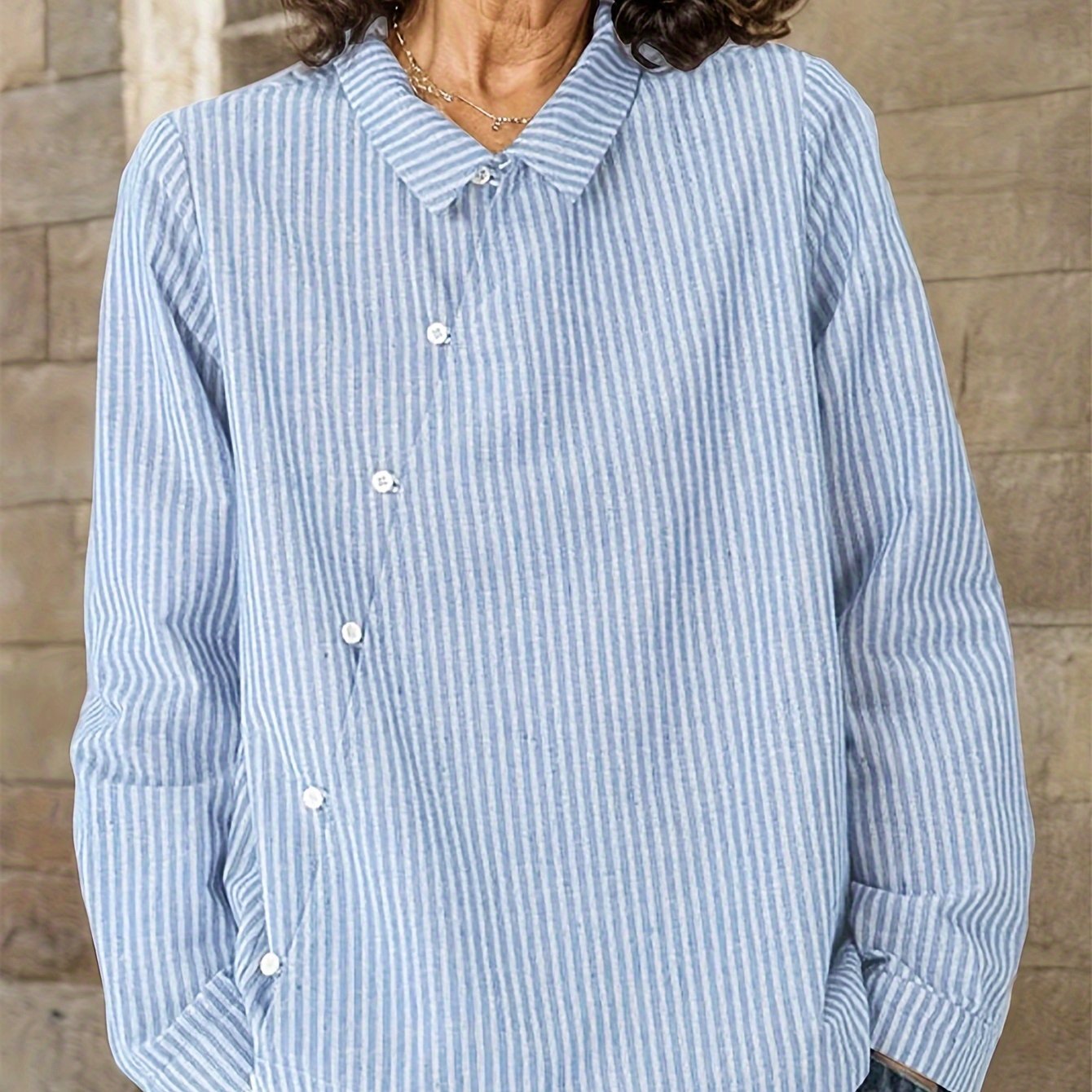 Casual striped cotton shirt for women with lapel collar, loose fit, and button front. Perfect for all seasons.