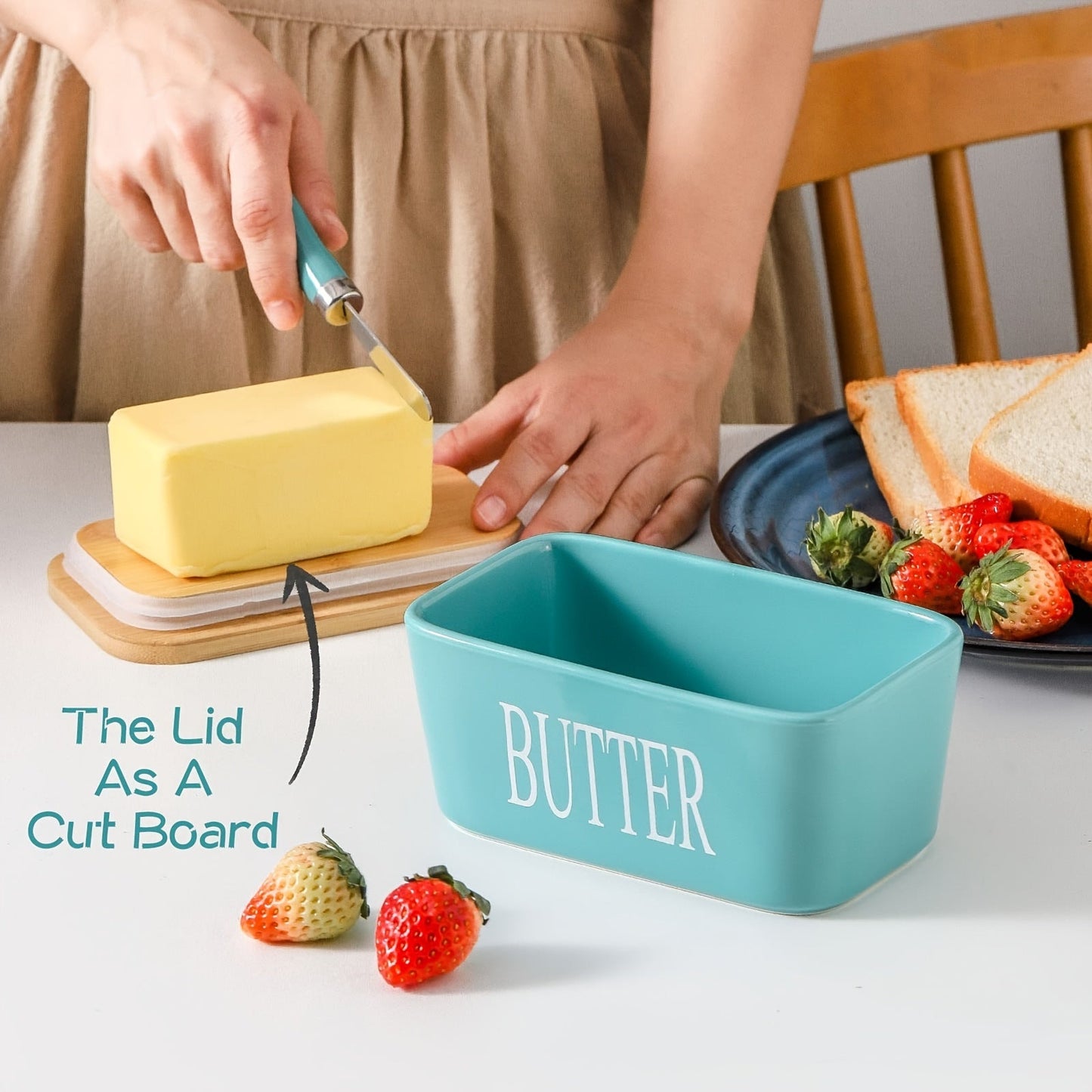 A complete set including a butter dish with a bamboo lid and butter knife, this large ceramic butter box is perfect for kitchen baking and gifting. It serves as an airtight butter keeper container for countertop or refrigerator storage. Ideal for home