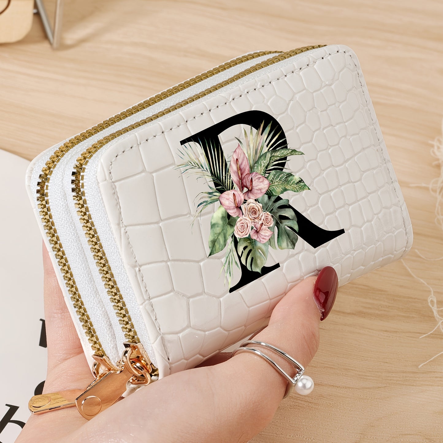 Women's credit card wallet with elegant floral letter print in black & white. Features large capacity, dual zipper, crocodile texture PU, lightweight design with nylon lining for everyday