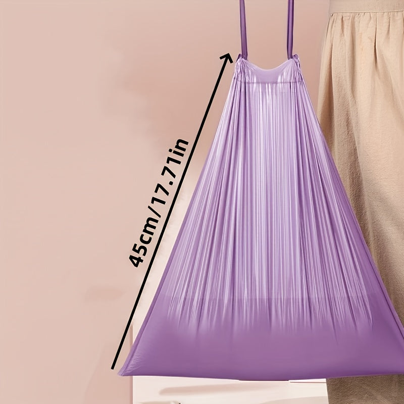 30-Pack of Extra Thick Purple Drawstring Trash Bags made of Disposable Plastic for use in the Kitchen, Bathroom, Bedroom, Dorm, RV, and Home. These Hand Carry Waste Bags are perfect for the Living Room, Toilet, and Car.