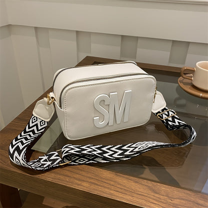 Fashionable PU crossbody bag with adjustable wide strap and zigzag pattern in multiple colors.