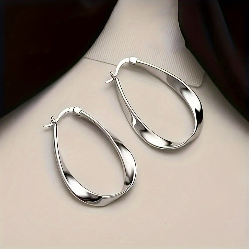 Sterling Silver Mobius Twist Hoop Earrings for Women - Elegant and Hypoallergenic, Ideal for Everyday Wear. The Perfect Gift Choice