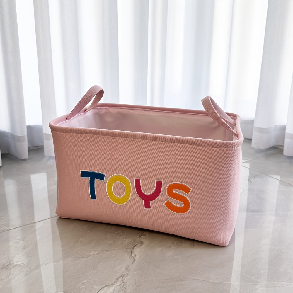 Stylish pink embroidered storage basket for girls. Great for organizing toys, clothes, and desks.