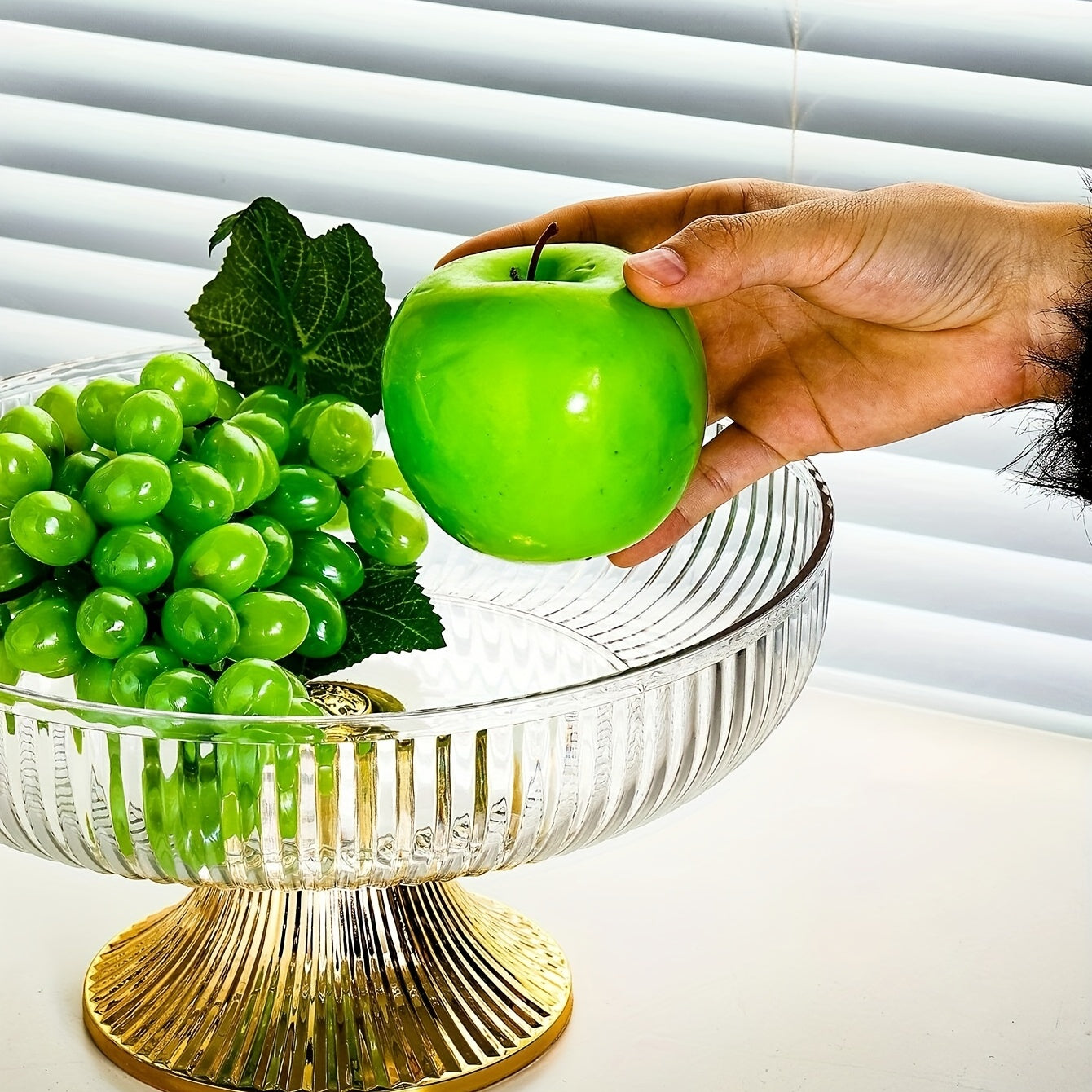 Beautiful acrylic fruit bowl with golden rim and luxurious texture. Perfect for snacks, candy, and fruits. Ideal for home decor, weddings, parties, and table centerpiece.