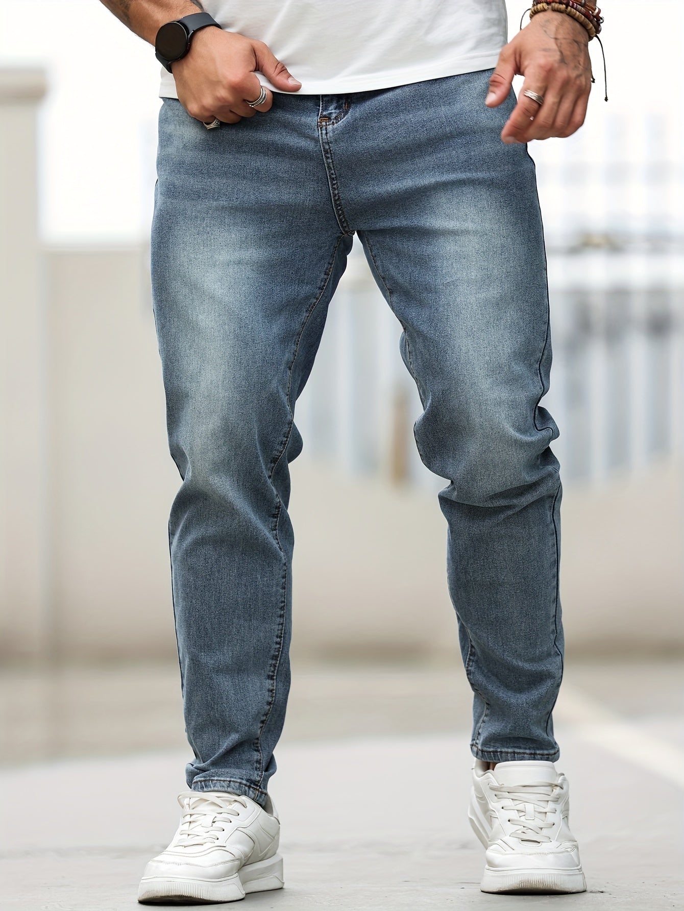 Men's plus size skinny jeans made of 68% cotton, 24% polyester, 6% tencel, and 2% elastane. Features casual solid color denim with pockets and medium stretch. Suitable for all seasons.