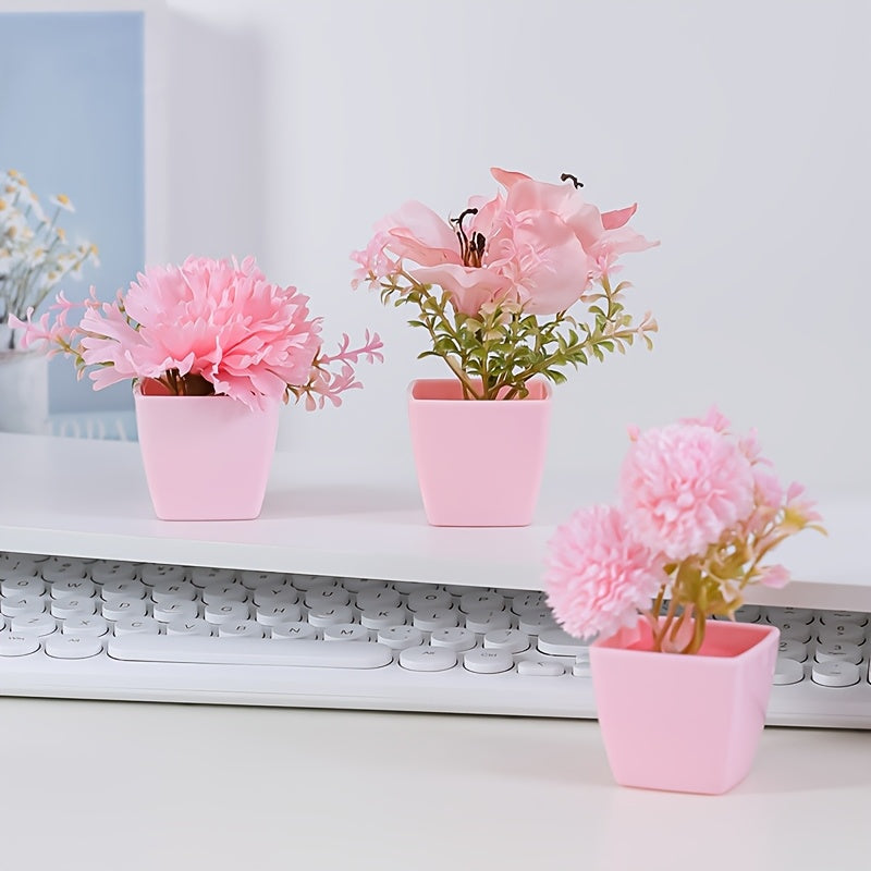 3-5 mini artificial potted pink flowers in plastic square pots, perfect for indoor décor on desks or bookshelves.