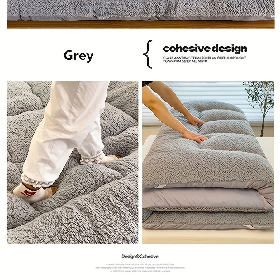 Soft, reversible gray mattress protector with corner straps for easy storage and transport. Ideal for cozy bedrooms.