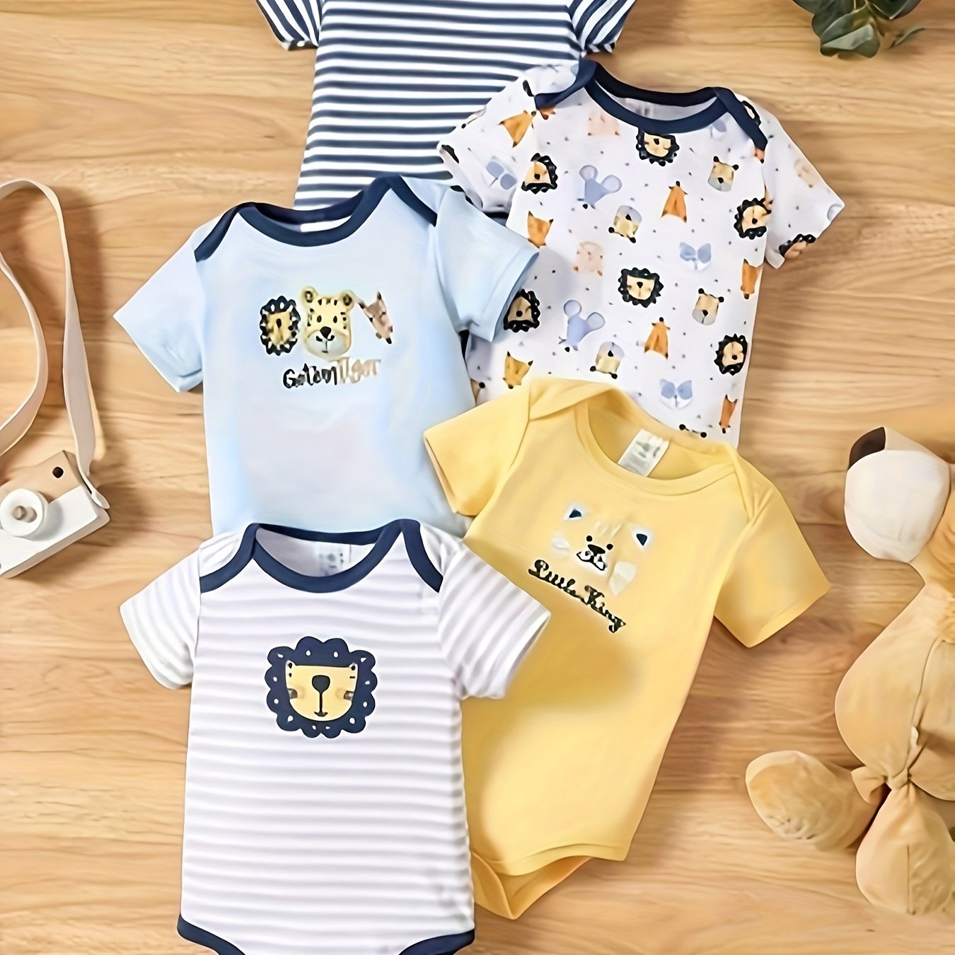 5 Baby boys jumpsuits with cartoon lion and stripe pattern, short sleeves, made of 100% cotton for outdoor activities.