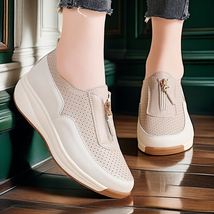 Beige perforated women's casual sneakers with zipper detail, thick sole, and anti-slip features.