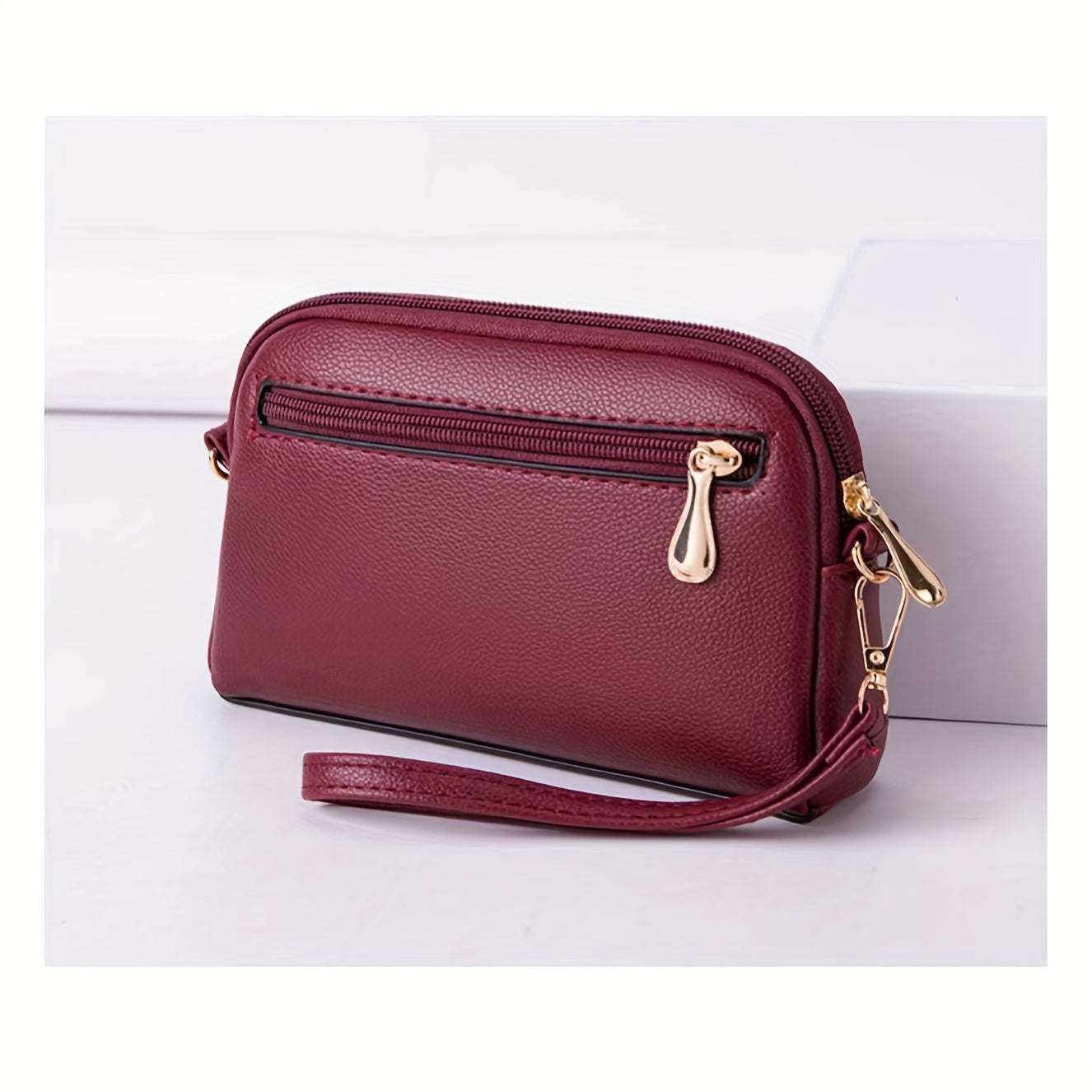 Stylish mini crossbody bag for women with removable strap and zipper closure. Suitable for commuting and shopping.