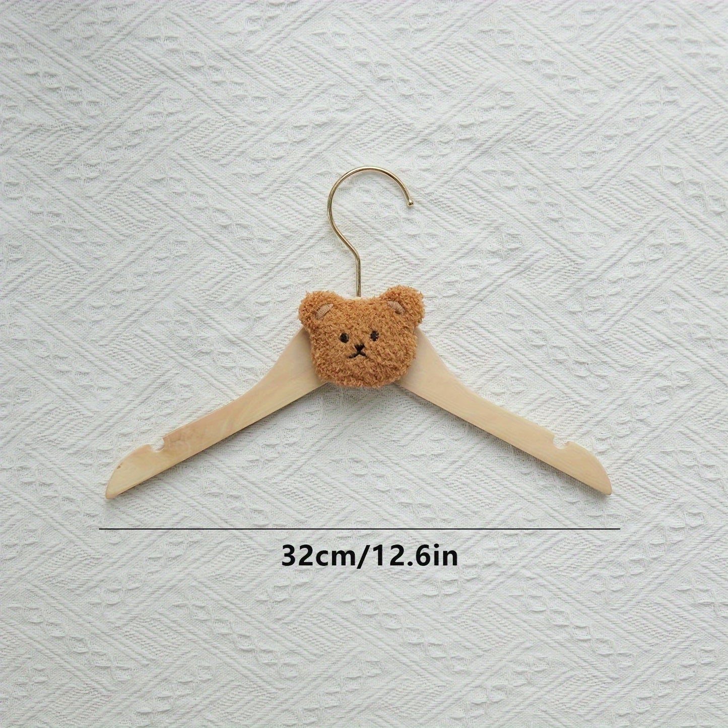 Durable and Lightweight Wooden Clothes Hangers featuring a Nordic Style Cartoon Bear Design, with Swivel Hooks for easy maneuvering. Recommended for Ages 14 and up.