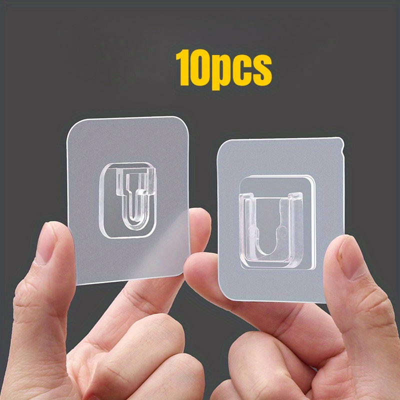 10 modern transparent plastic adhesive hooks with interlocking buckle for easy installation on walls and doors. Great for bathroom and door organization.