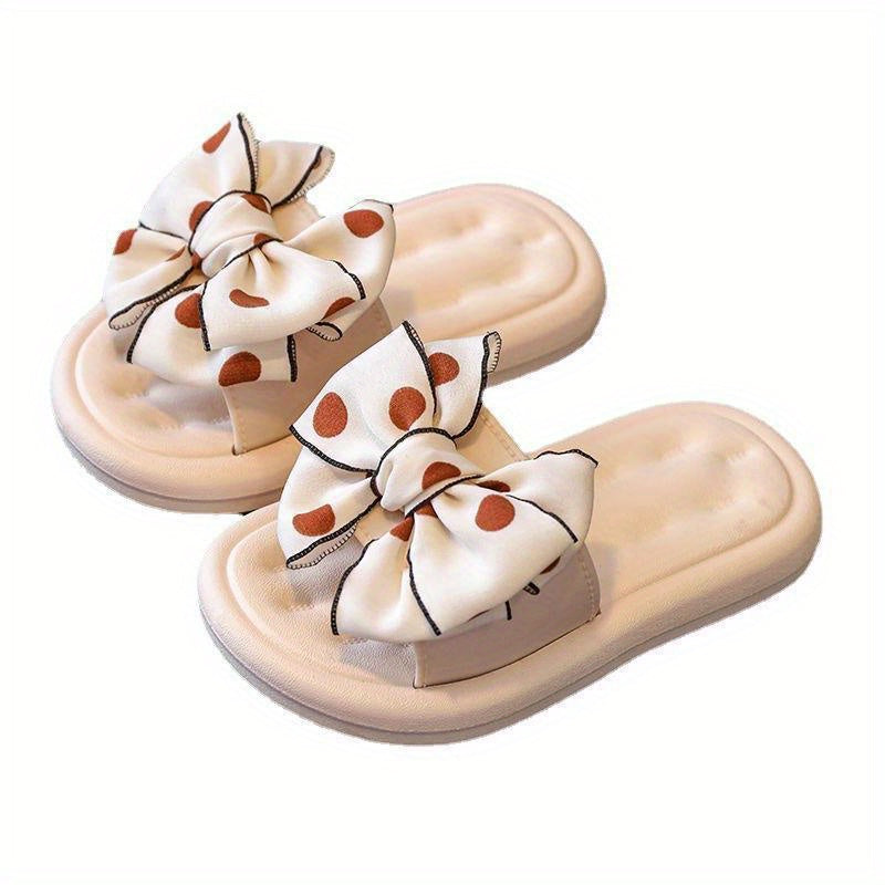 Stylish bowknot slippers for girls that are non-slip and lightweight, suitable for indoor, outdoor, pool, and beach use in all seasons.