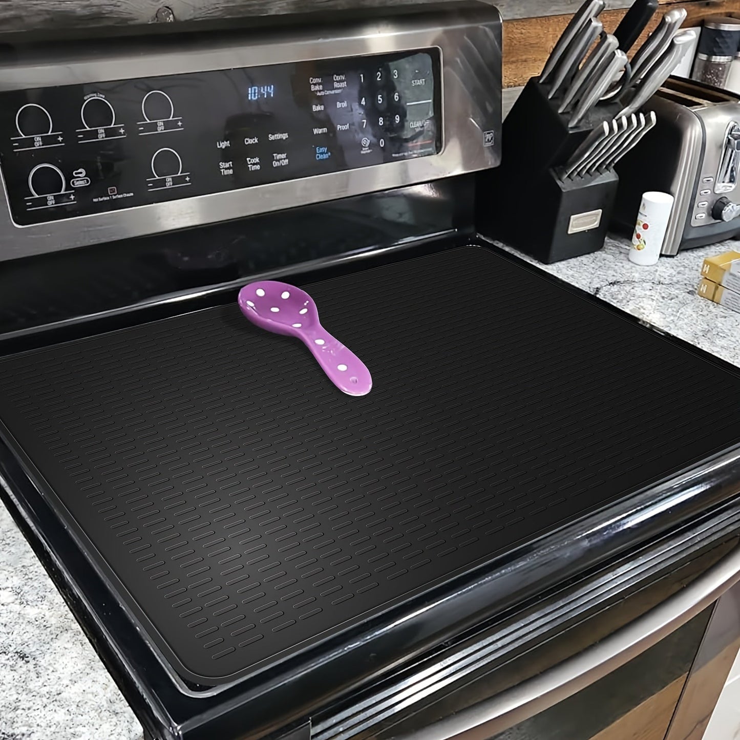 Protect your electric stove with our Silicone Stove Top Cover Pad. This heat-resistant glass cover features anti-slip properties and is waterproof. It is foldable for convenient storage and has raised wide ridges for added safety. Ideal for home kitchen