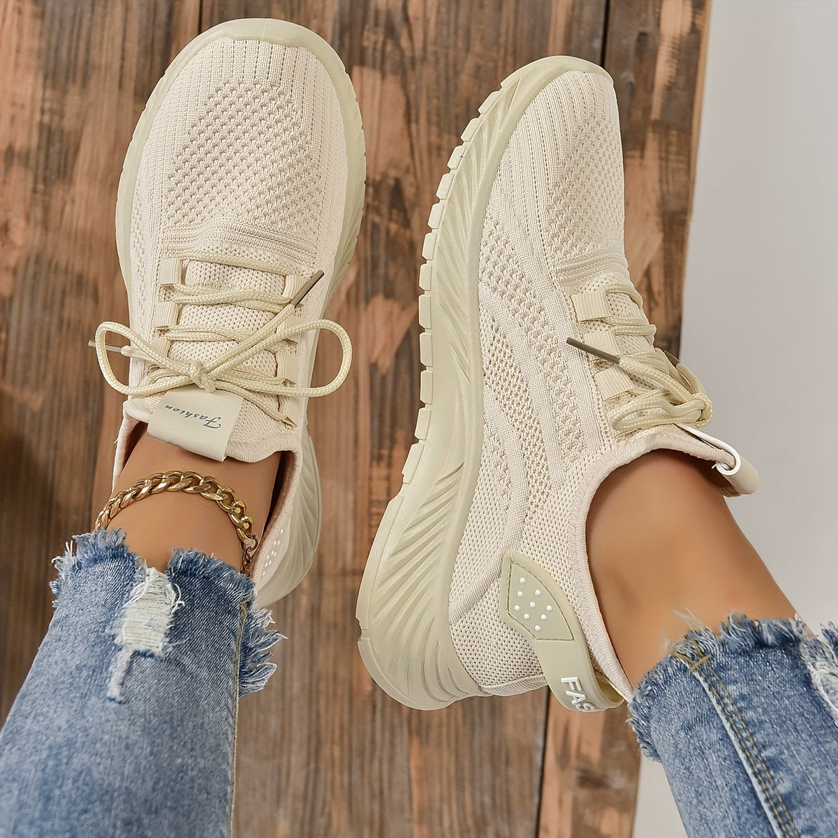 Trendy white knit fabric sneakers for women with EVA sole and breathable lace-up design, suitable for all seasons. Lightweight and stylish.