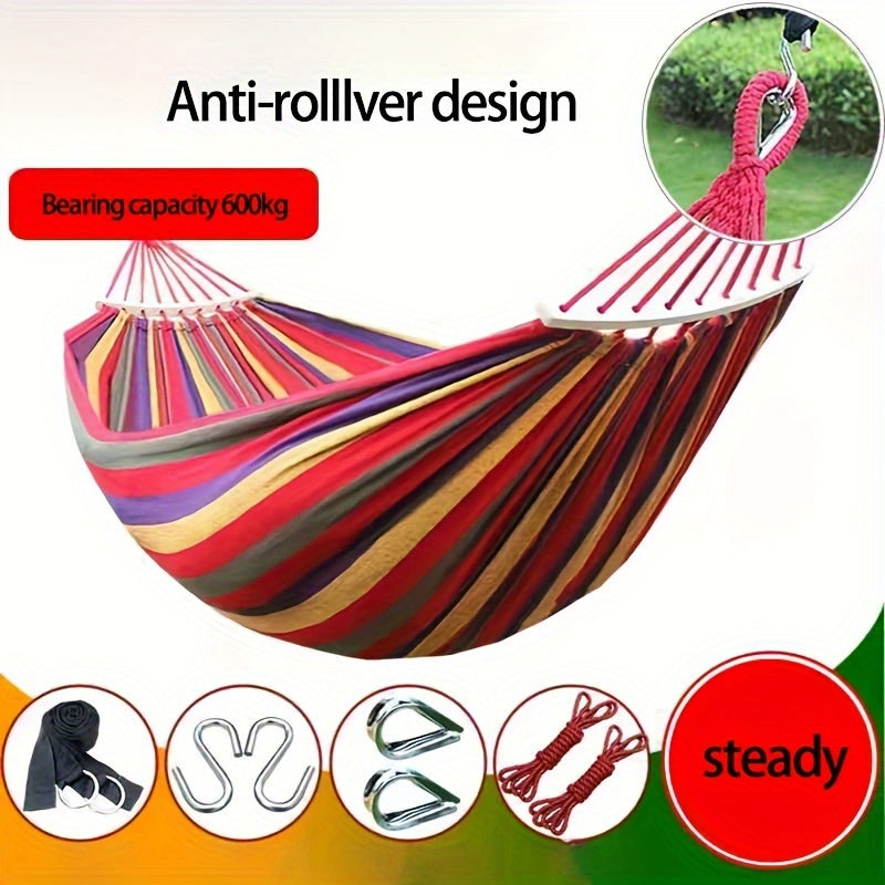 Heavy-duty rainbow canvas hammock for single or double with curved wooden sticks and a weight capacity of 226.8 KG. Includes tree straps for camping, backyard, or patio. High-strength