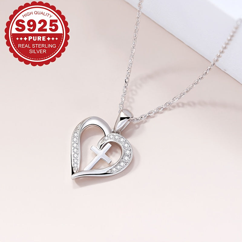 Elegantly designed heart cross pendant necklace made of Sterling Silver S925, adorned with Synthetic Zirconia. Hypoallergenic and lightweight at 4.5g, ideal for everyday wear or as a special Valentine's Day gift. Presented in a gift box for easy gifting.