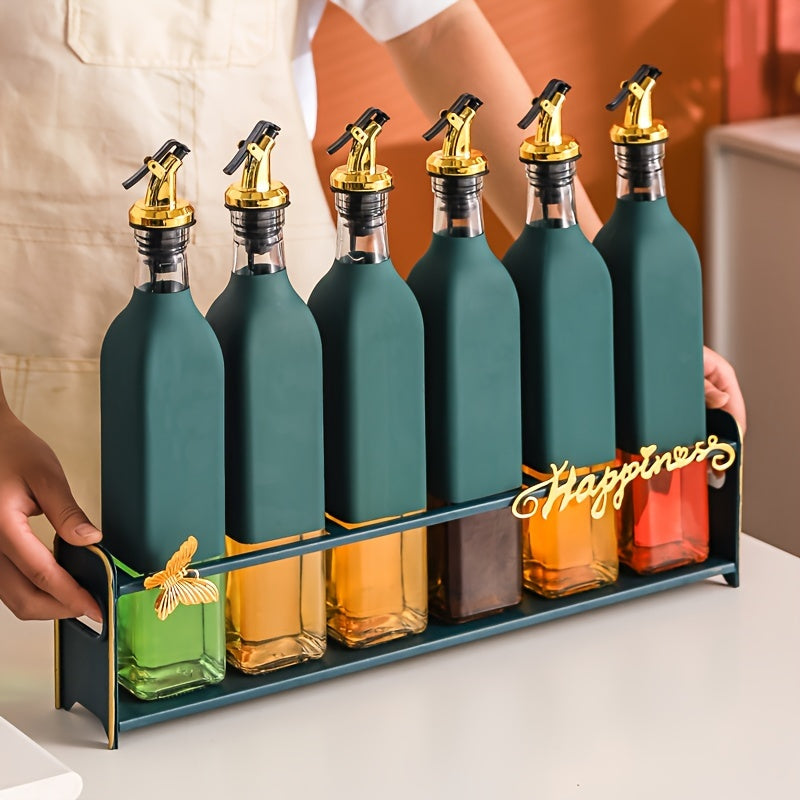 Set of elegant glass olive oil dispenser bottles, perfect for the kitchen. They are leakproof and must be hand washed. The set includes BPS-free square glass bottles with pourers, ideal for storing vinegar, soy sauce, and other seasonings. These bottles