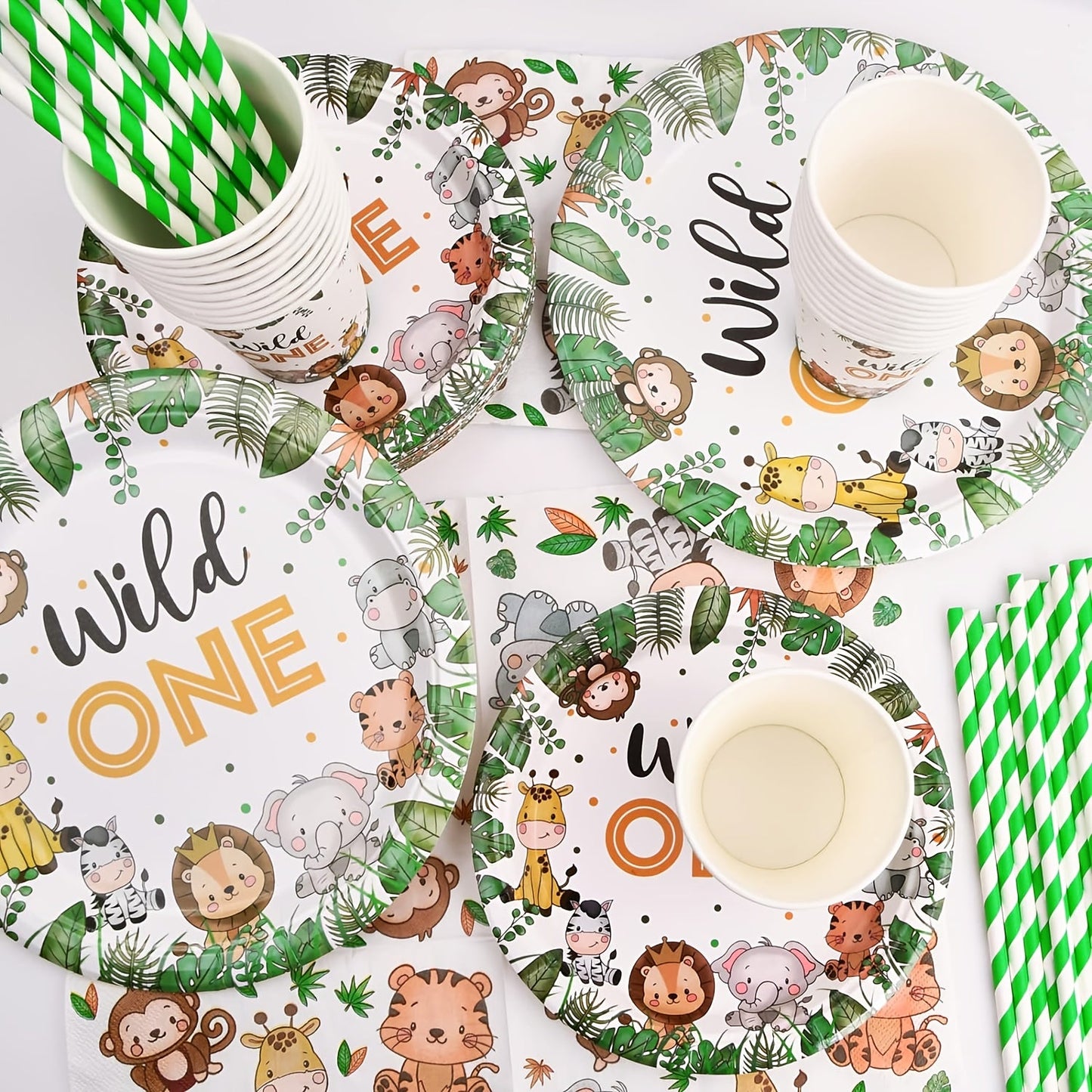 Celebrate with 68 pieces of Wild One birthday decorations! This Jungle theme party set includes paper plates, cups, and napkins, perfect for a 1st birthday celebration. Add some fun animal jungle decorations to your party table with this dinnerware set.