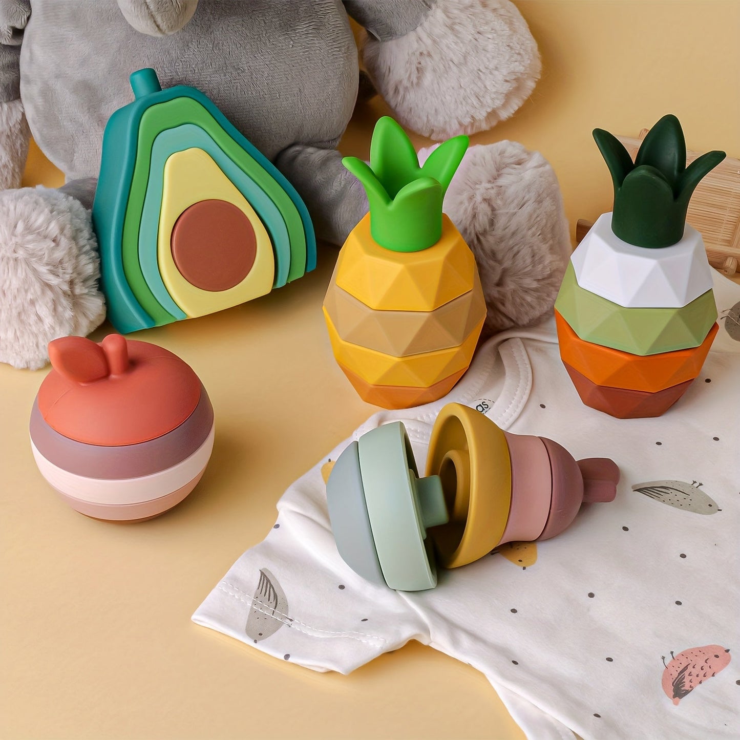 TYRY.HU presents Silicone Stacking Toys for babies, featuring a Fruit Nesting Design with BPA-free Soft Silicone materials. These Colorful Stacking Blocks come with Rubber Teething Toy shapes for Shape & Color Matching education development. A perfect