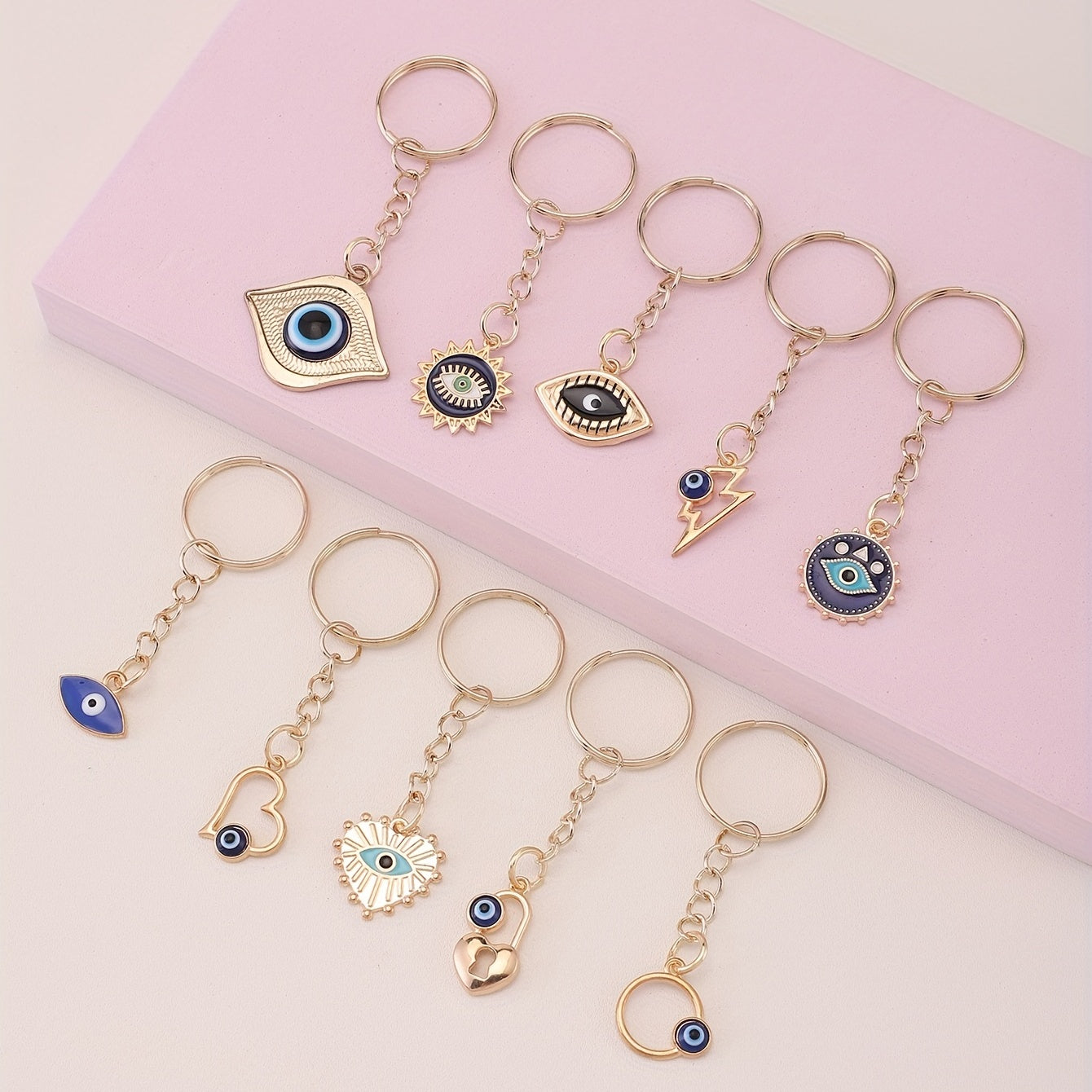 A set of 10 Evil Eye keychain amulets for good luck, perfect for attaching to your keys, purse, bag, backpack, or car keys. These charms also make great party favors or accessories for making jewelry gifts.