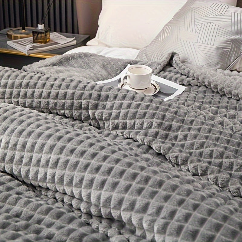 Soft and comfortable waffle plush blanket, made of milk velvet, perfect for use in the bedroom, sofa, office, car, camping, and travel. This multifunctional blanket comes in white, gray, green, brown, and silvery gray solid colors and checkered pattern.