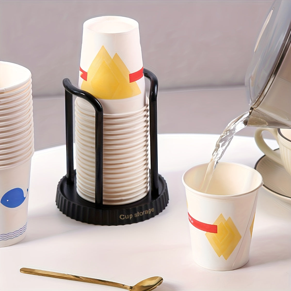 Introducing a simple plastic cup holder specially designed for organizing teacups in your kitchen or dining area. Crafted from durable plastic, this holder is perfect for disposable cups and provides a convenient storage solution for various spaces such