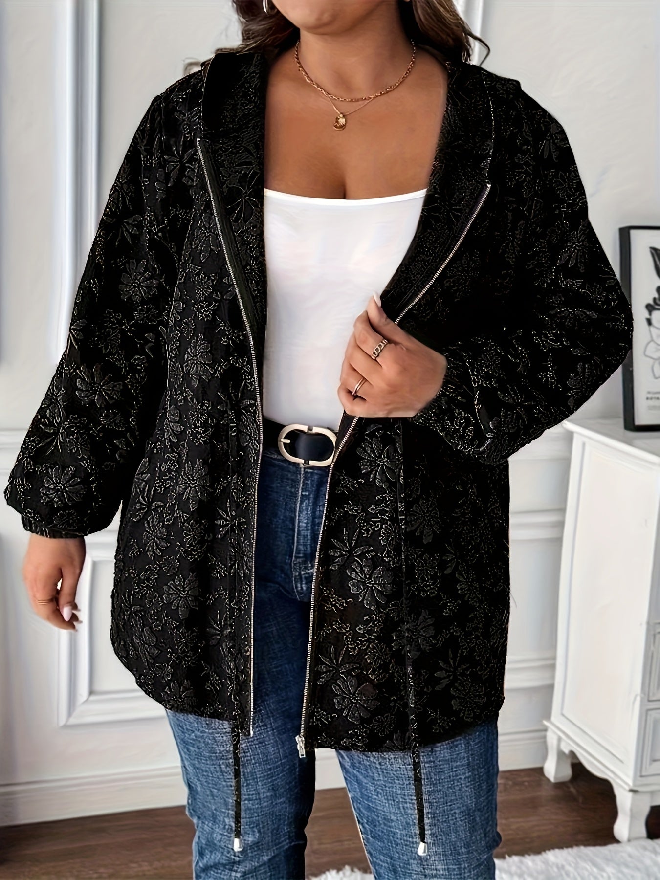 Stylish black floral jacquard hoodie jacket for plus-size women with drawstring and pockets.