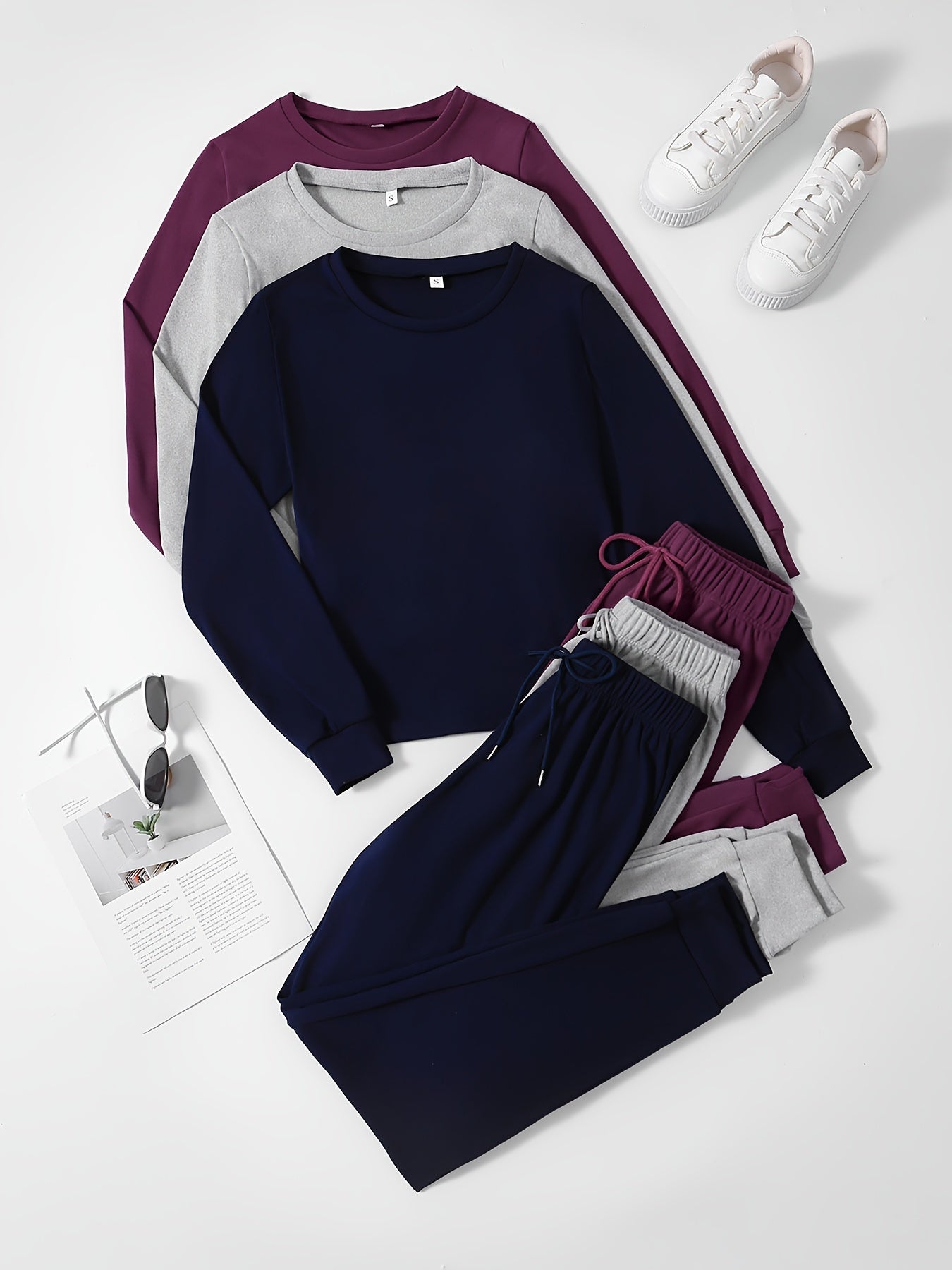 Women's 3-piece lounge set with long sleeve top and jogger pants for a comfortable and relaxed fit in fall.