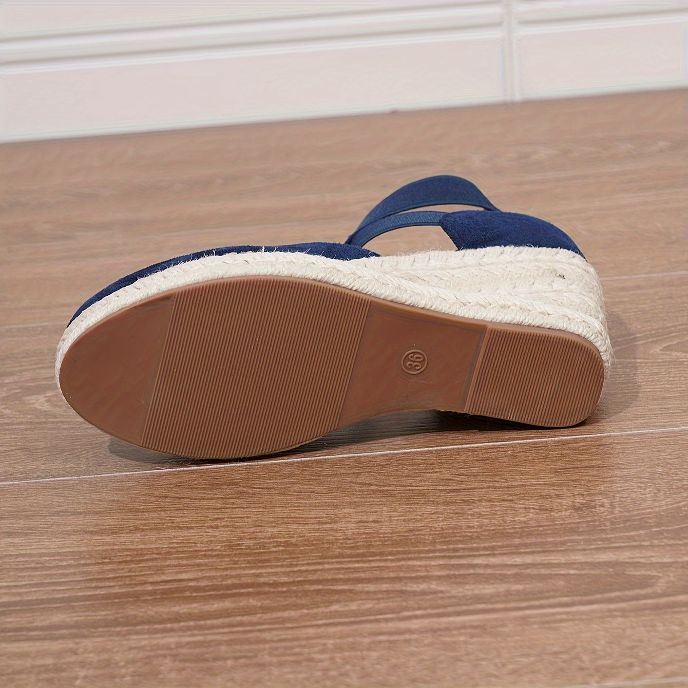 Women's slip-on wedge sandals with elastic cross straps, round toe, and non-slip sole.