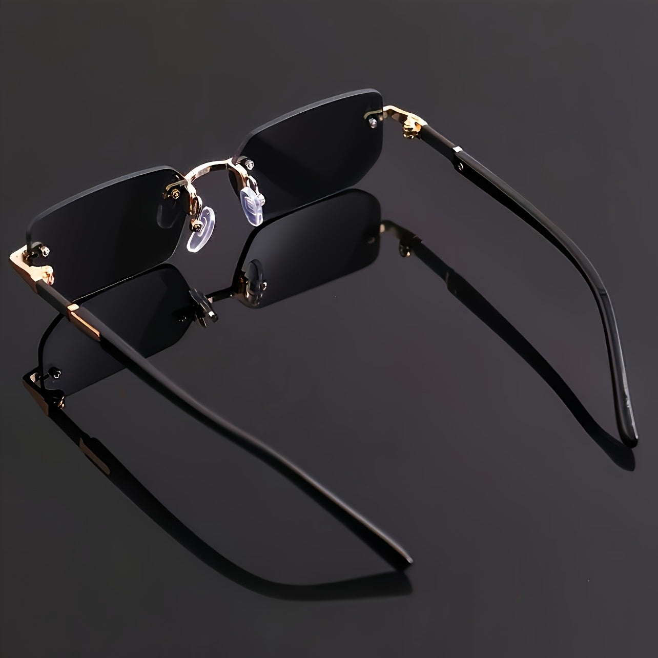 One pair of men's square rimless glasses in black with mirrored PC lens and metal frame for casual hip hop fashion.