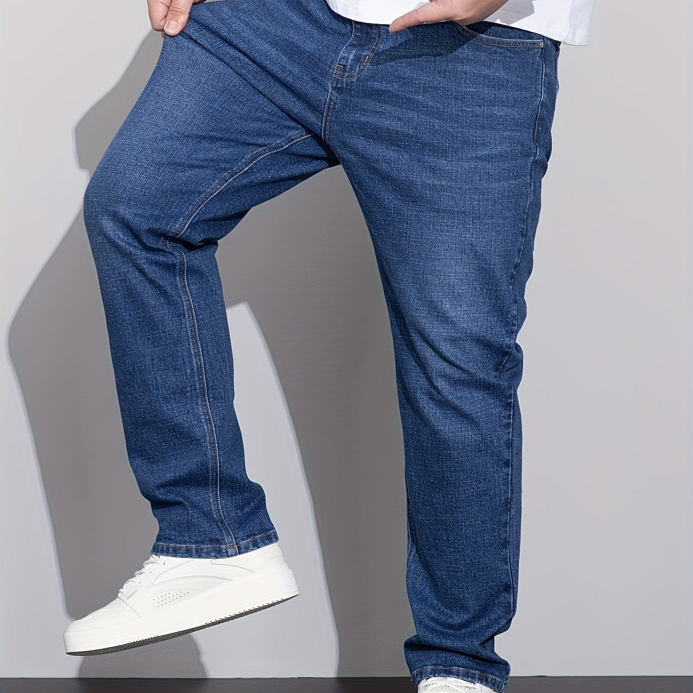 Comfortable stretch denim jeans for plus size men with versatile business style, straight-leg, and machine washable