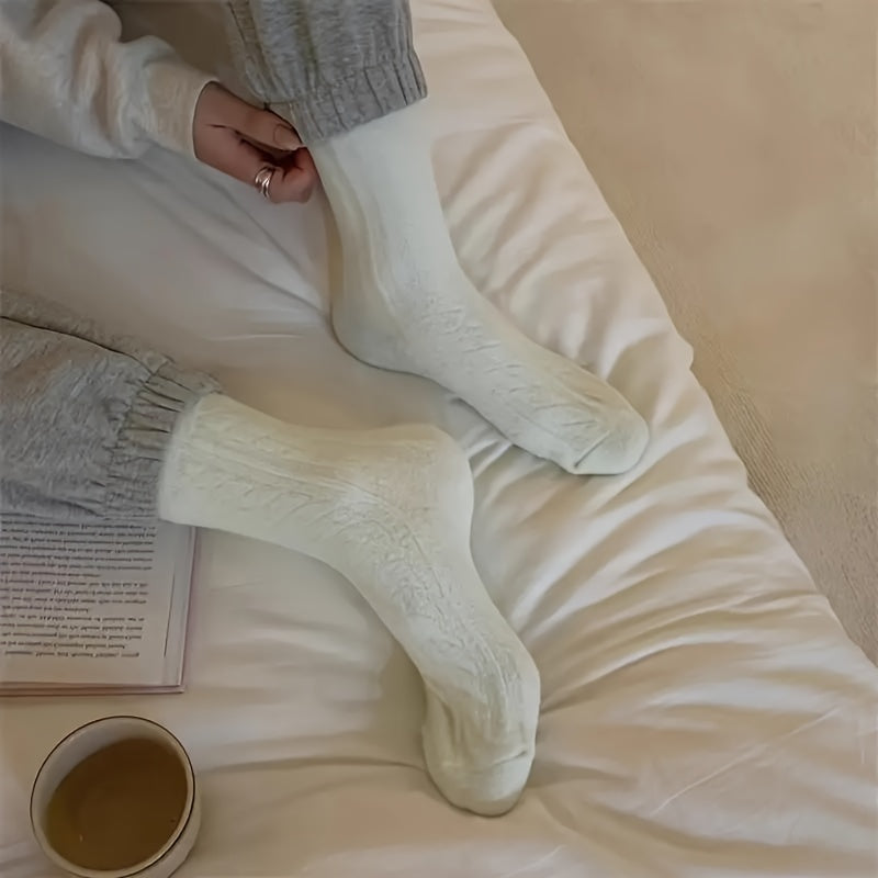 5 pairs of cozy knit socks for women made from a soft and warm blend of polyester (95%) and spandex (5%). Featuring a solid color twist pattern, these mid-calf socks are hand washable and