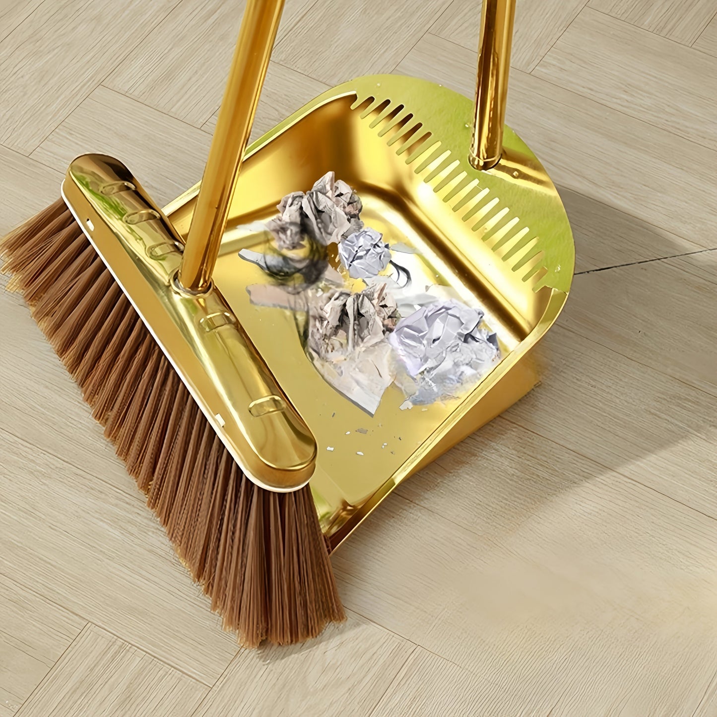 Two-piece set of durable stainless steel garbage shovel and water scraper with golden finish, thickened design, and integrated mop dustpan for household cleaning.