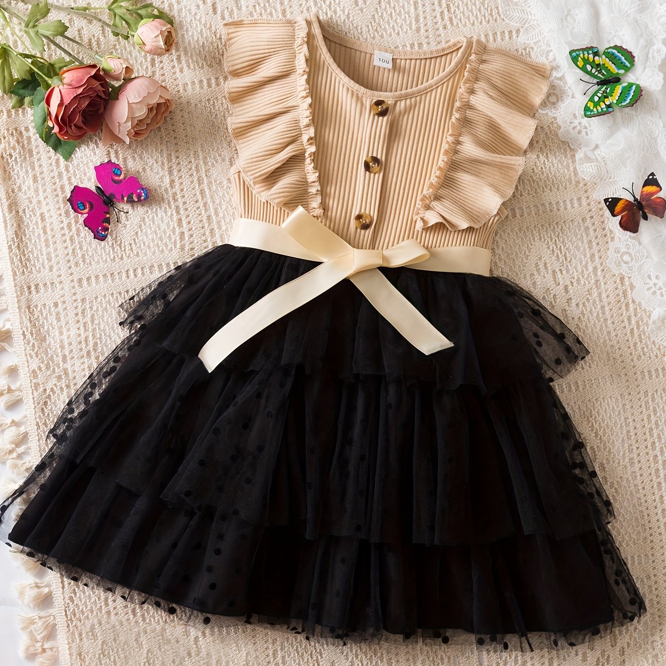 Elegant polka dot print tutu dress with button design for summer parties.