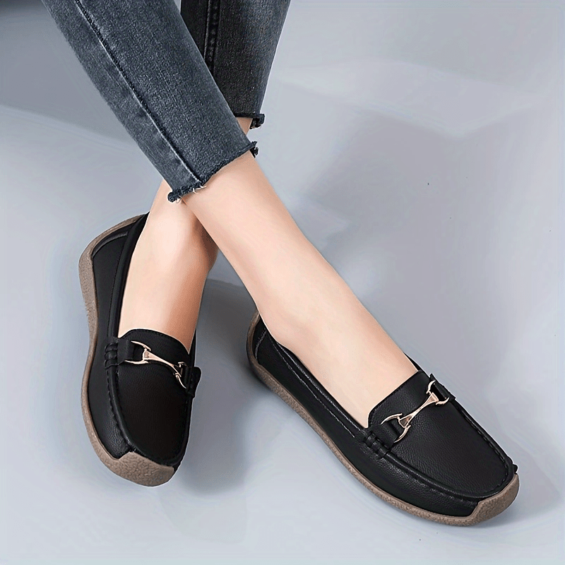 Women's metal decor slip on loafers for casual walking with non-slip flat soles.