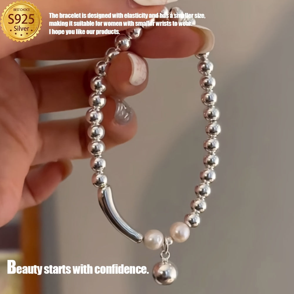 This Elegant Silvery Bracelet features embedded pearls, exuding luxury and sophistication. With a high-end and unique design, it is cool, refreshing, and perfect for those seeking individuality. This exquisite piece is a great gift, guaranteed to bring