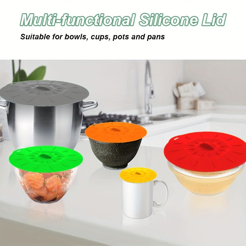 A collection of 5 durable silicone lids that are perfect for covering bowls, cups, plates, pots, pans, and more. These versatile covers can be used in the microwave, stovetop, oven, fridge, and freezer. They are BPA-free and come in various sizes to suit