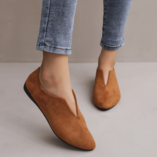 Women's solid color casual flats with a soft sole and point toe.