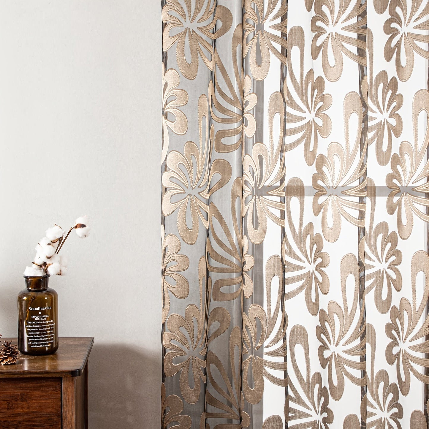 This Elegant Geometric Sheer Curtain Panel in Brown & White Floral Jacquard Design is made of lightweight polyester. It is machine washable and comes with eyelets for easy hanging. Ideal for enhancing the decor of your living room or bedroom.