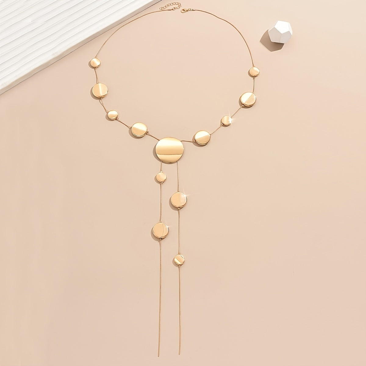 Stylish Long Y-Shaped Necklace in Elegant Golden Tones with Geometric Round Beads - Effortlessly Chic and Fashionable, Ideal for Everyday Wear.