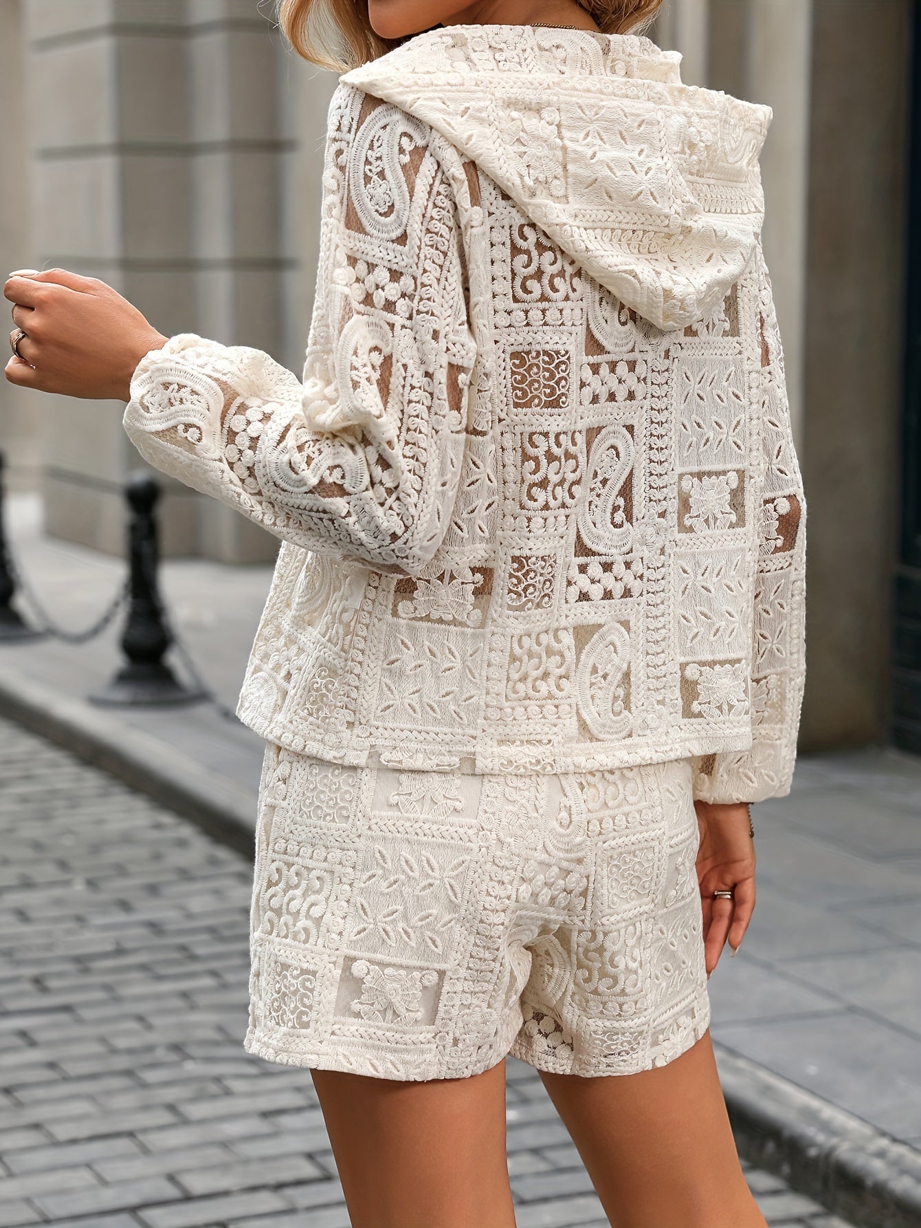 Guipure lace two-piece set including a casual long sleeve hoodie and shorts outfit for women.