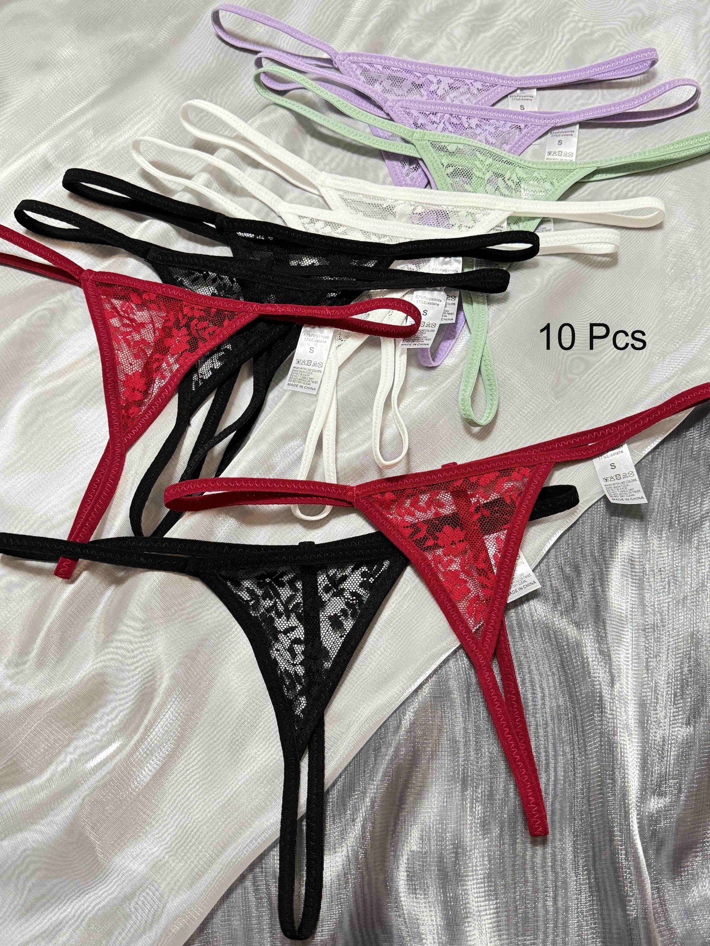 10-pack of sexy lace thong panties for women, low-rise polyamide fabric, transparent triangle design, adult theme, solid color with lace detailing