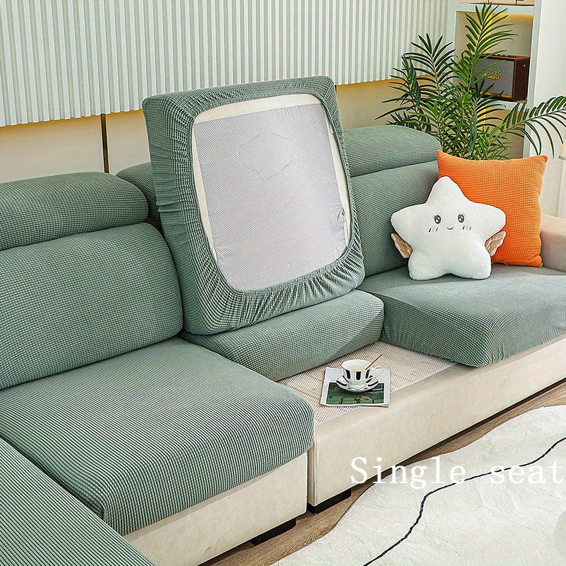 Anti-slip sofa cushion cover with elastic band for universal furniture protection in bedroom, office, and living room. Four seasons slipcover for comfortable and stylish seating.