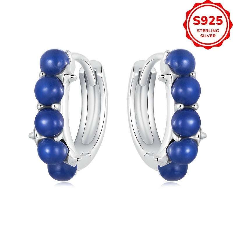 Add a touch of elegance to your outfit with these stylish women's hoop earrings featuring synthetic lapis lazuli beads. Made with 925 sterling silver, these luxurious earrings are perfect for vacations, weddings, casual parties, or as a holiday gift.