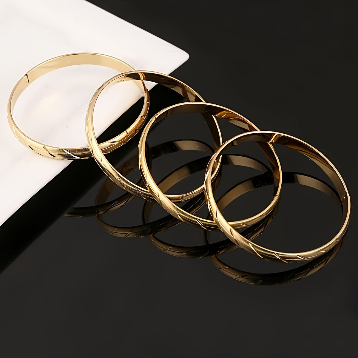 Set of 4 Bohemian African Style Women's Fashion Bangle Set, Copper Plated with Golden Finish. Great for Engagements, Weddings, Parties, and as a Gift. Suitable for All Seasons and Particularly Perfect for Lunar New Year Celebrations.