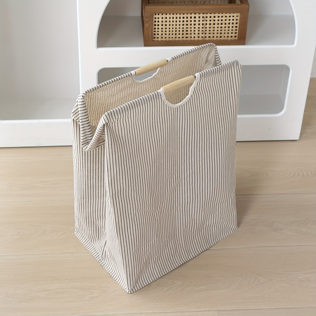 Fold and store your laundry easily with this 1-piece collapsible laundry basket. Featuring handles for easy transportation, this large hamper is perfect for storing clothes, towels, and toys in your family or dorm. Keep your bathroom, bedroom, or laundry