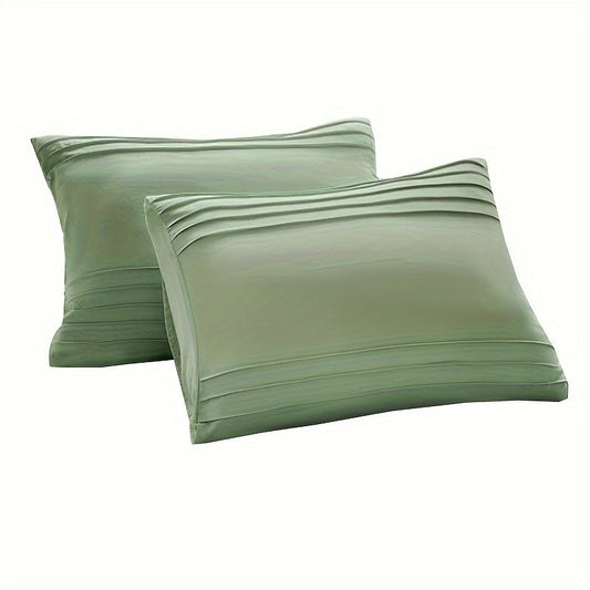 Soft, breathable pillow covers featuring a pleated fiber design in a solid color. This set includes 2 pillowcases (pillow core not included) that are perfect for decorating your bedroom, sofa, or home. Made with premium quality materials, these pillow